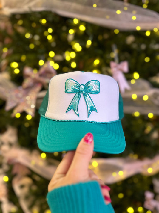 TURQUOISE BOW TRUCKER HAT